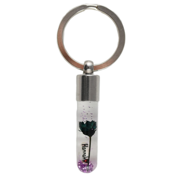 Schlüsselanhänger personalisiert mit schwarzem Blümchen oder Ästchen und Reiskorn